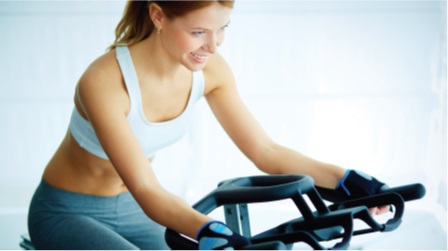 Lady on an exercise bike